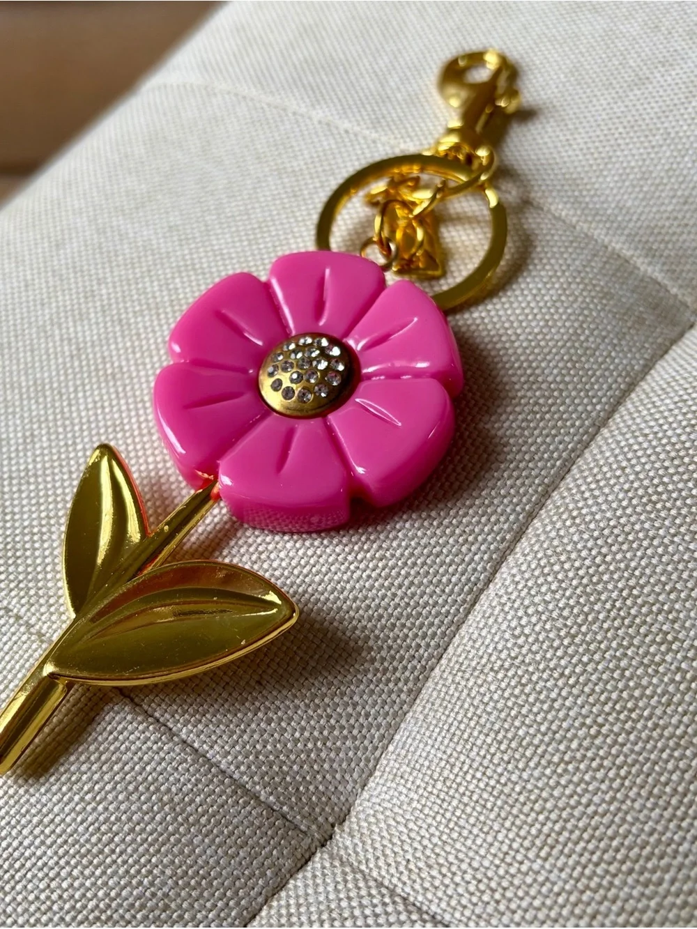 Stylish Pink Flower Keychain with Gold-Tone Stem